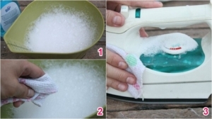 Làm sạch bàn ủi dính vải bằng muối thô